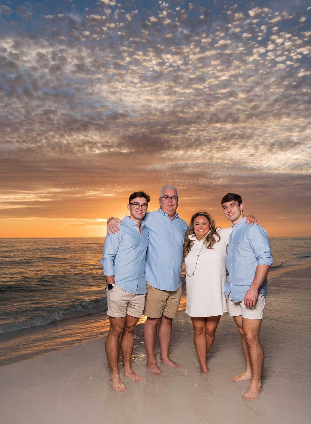Todd and Christina Knight with their sons Christian and Ethan on the beach